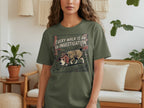 T-shirt with illustration of a beagle detective on a dark green background.