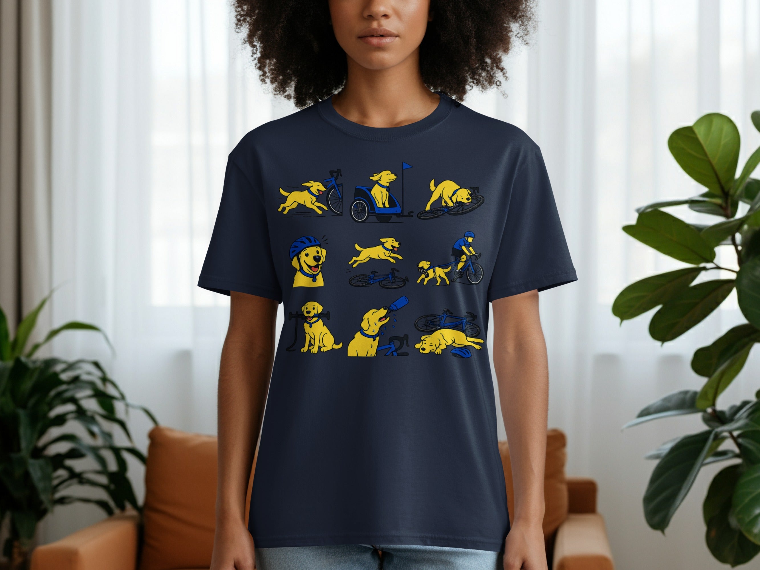 Dark blue t-shirt with a repeating illustrated pattern of yellow dogs and bicycles.