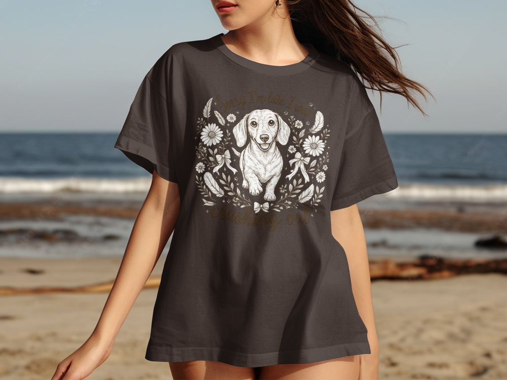 Dachshund t-shirt with "Sorry I'm late I was crushing out" text and floral border.