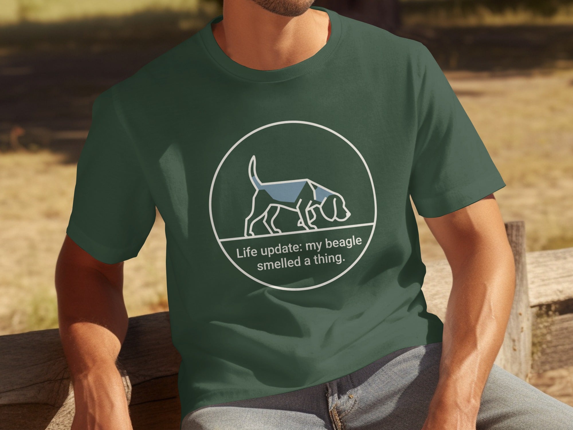 Green t-shirt with a beagle illustration and text "Life update: my beagle smelled a thing."