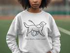 White sweatshirt with a line drawing of a dog on a leash and text "Slow down, enjoy walks".