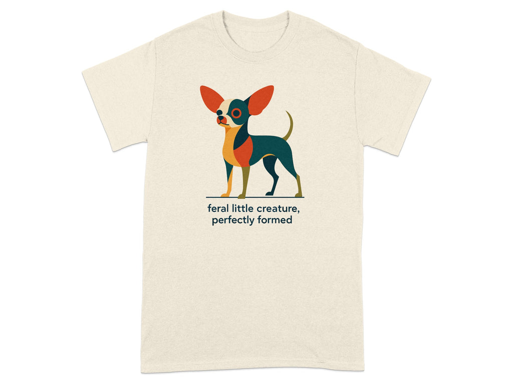 Cream t-shirt with a stylized dog graphic and text "feral little creature, perfectly formed."