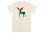 Cream t-shirt with a stylized dog graphic and text "feral little creature, perfectly formed."