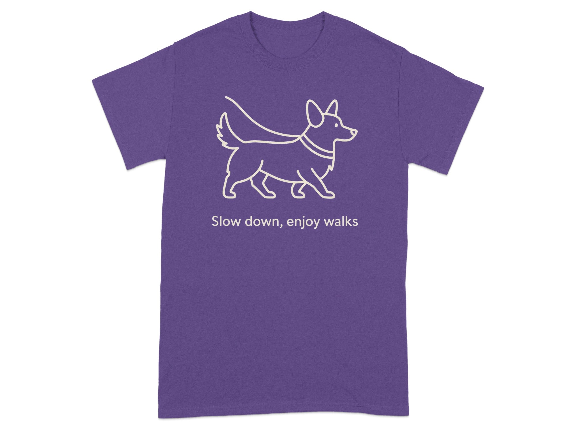 Purple t-shirt with a white outline of a corgi and the text "Slow down, enjoy walks."