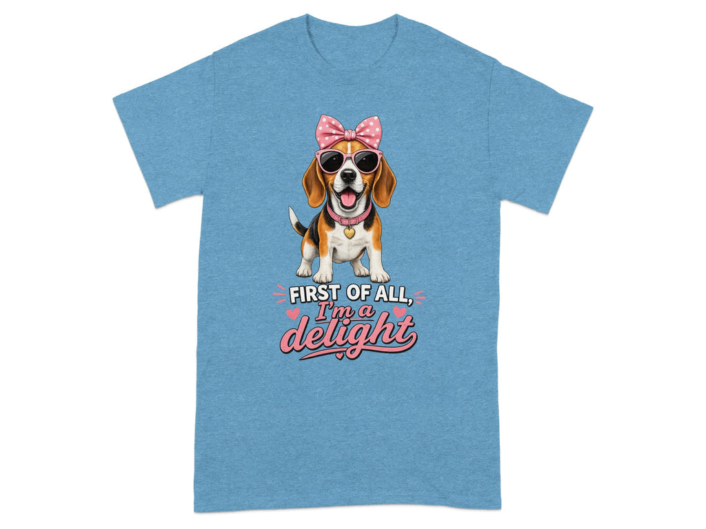 Blue t-shirt with a beagle wearing sunglasses and a pink bow, text reads "First of all, I'm a delight".