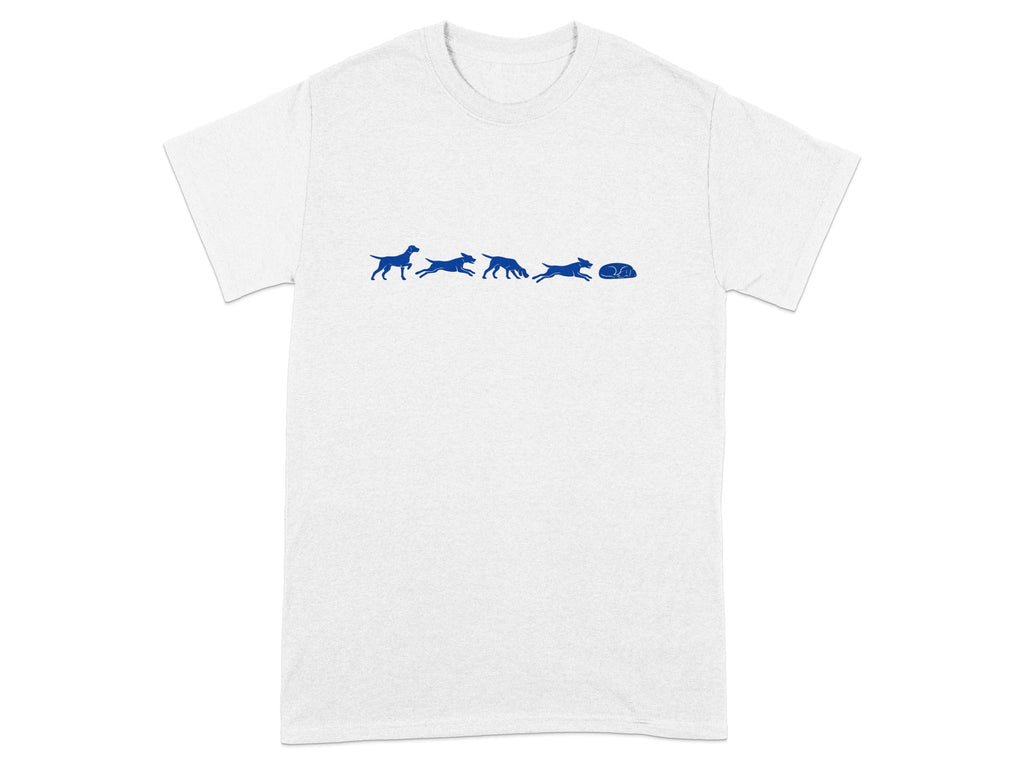 White t-shirt with blue graphic of dogs running towards a dog bed.