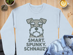 Light blue sweatshirt with a cartoon schnauzer and text "SMART. SPUNKY. SCHNAUZY."