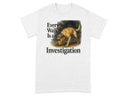 White t-shirt with a Labrador wearing a hat and the text "Every Walk Is an Investigation".
