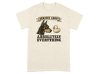 Cream t-shirt with Doberman and rubber duck graphic and text "SERIOUS ABOUT ABSOLUTELY EVERYTHING".