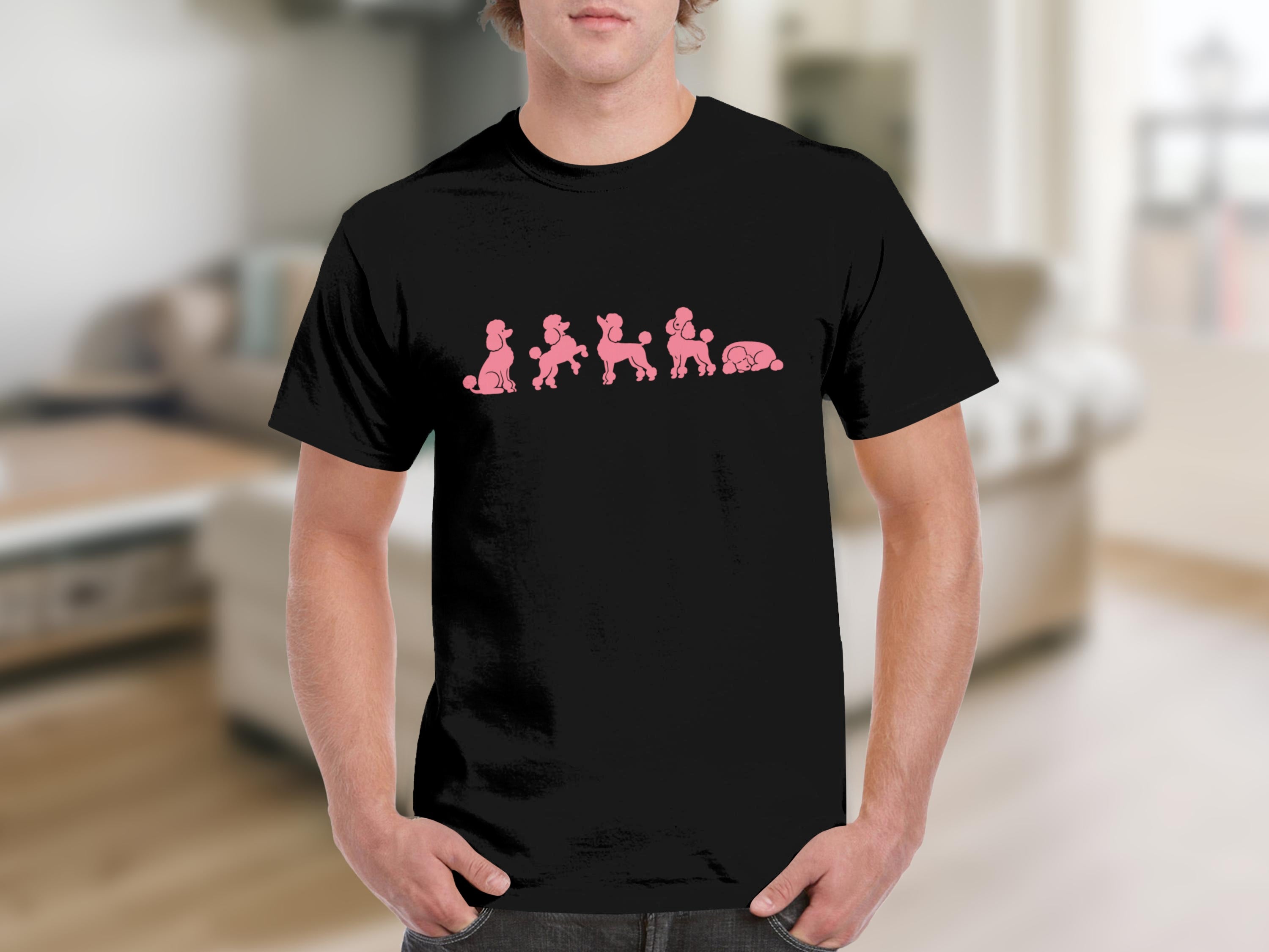 Black t-shirt with a row of pink poodles in various poses.