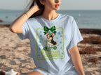 Light blue t-shirt with a corgi riding a scooter, text "OFF TO HAVE A CRASHOUT."