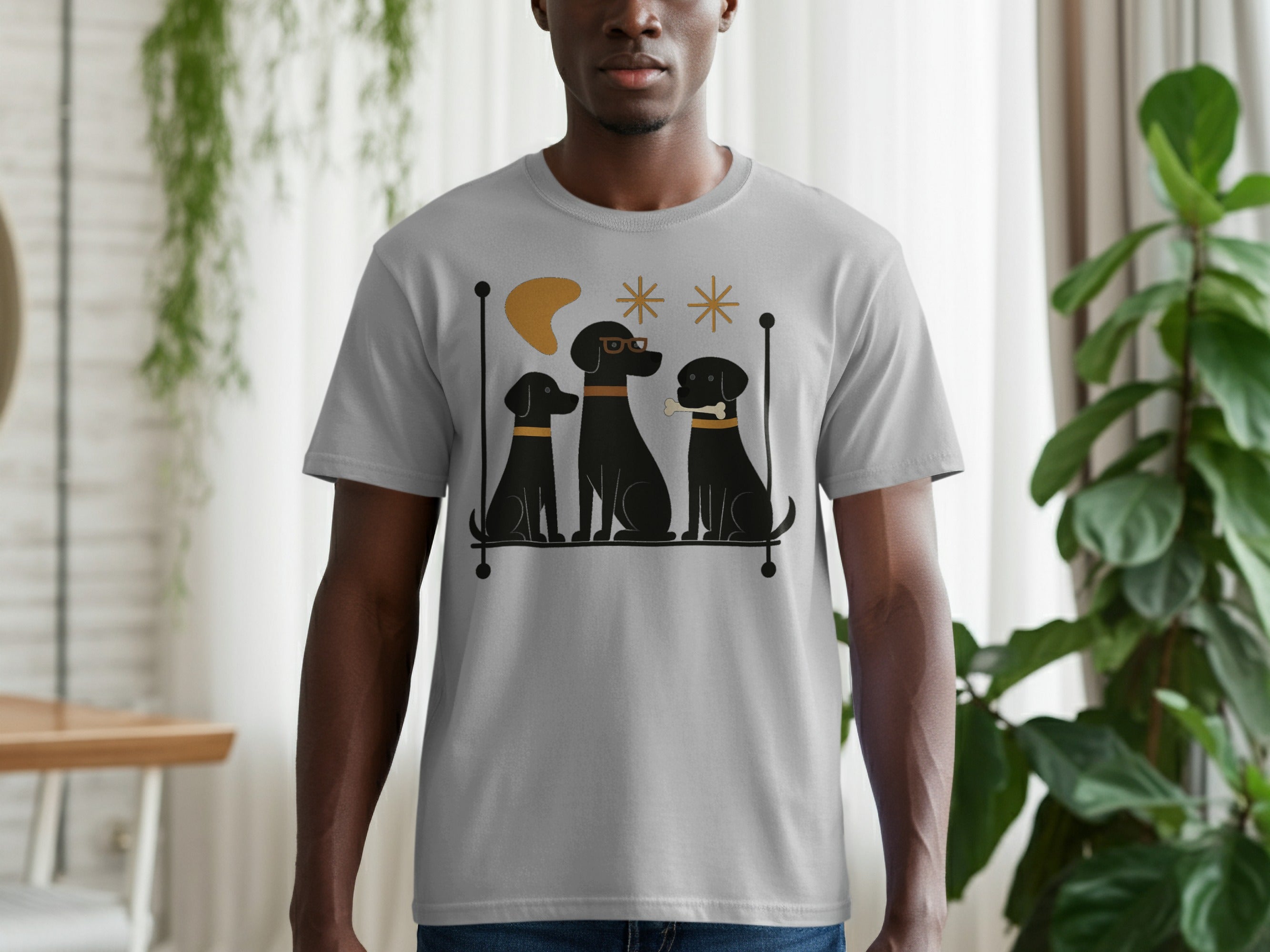 Grey t-shirt with graphic of three black dogs on a shelf, one with glasses.