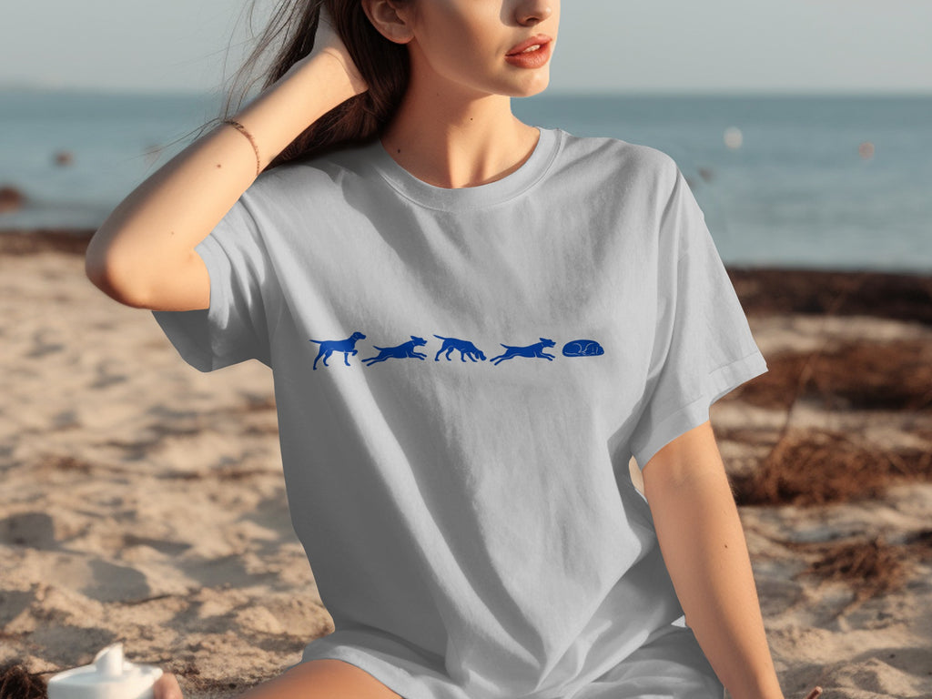 Light blue t-shirt with blue dog silhouette sequence on beach background