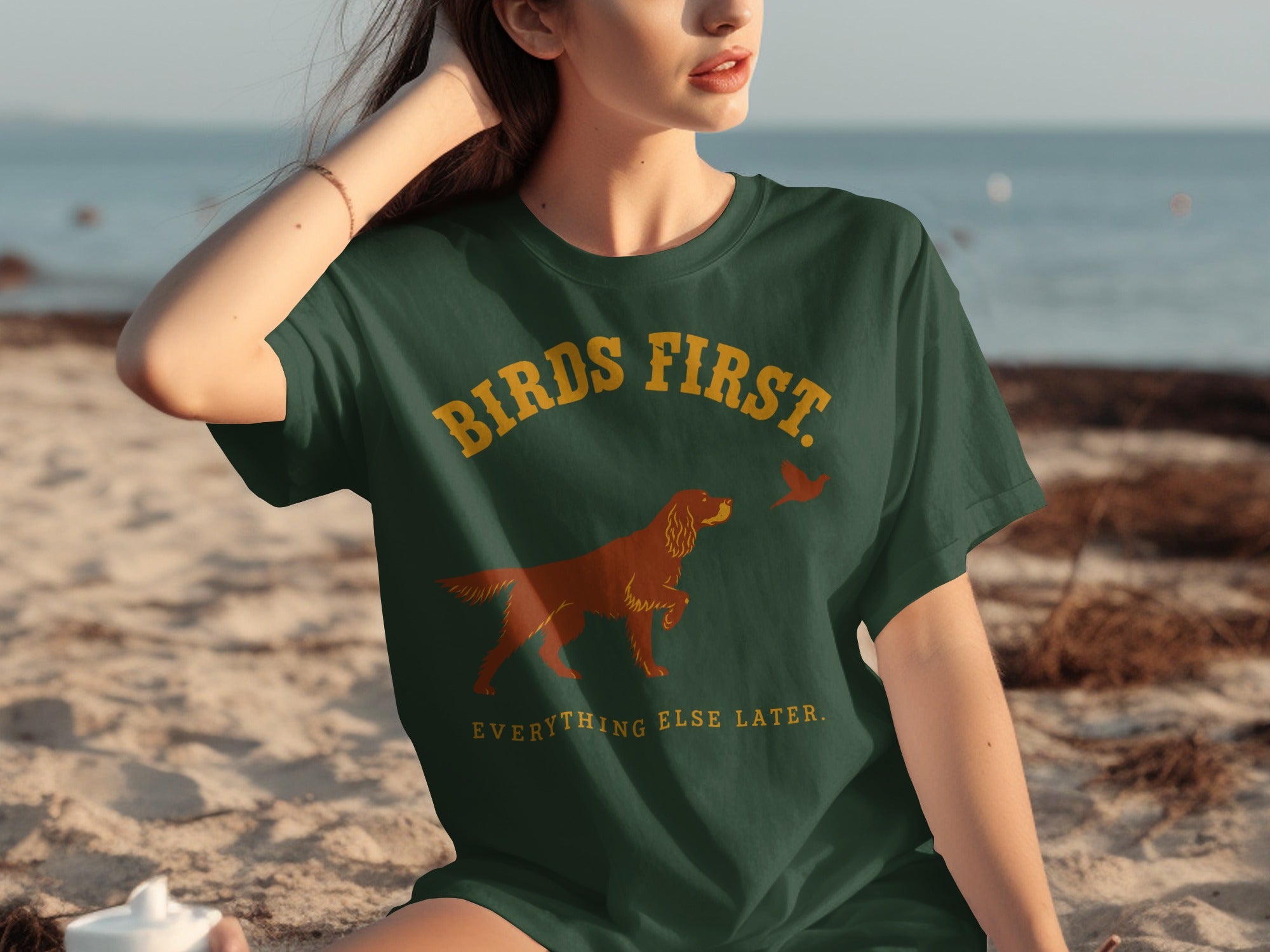 Green t-shirt with "BIRDS FIRST EVERYTHING ELSE LATER" and a dog and bird graphic.