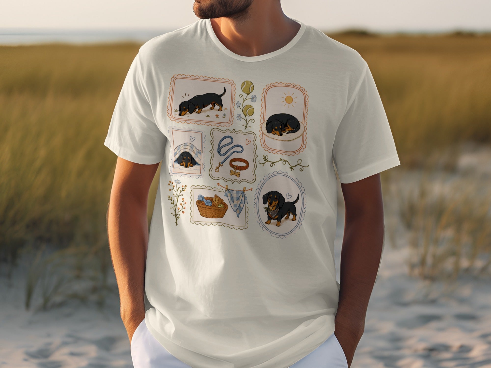 White t-shirt with framed illustrations of dachshunds playing and sleeping.