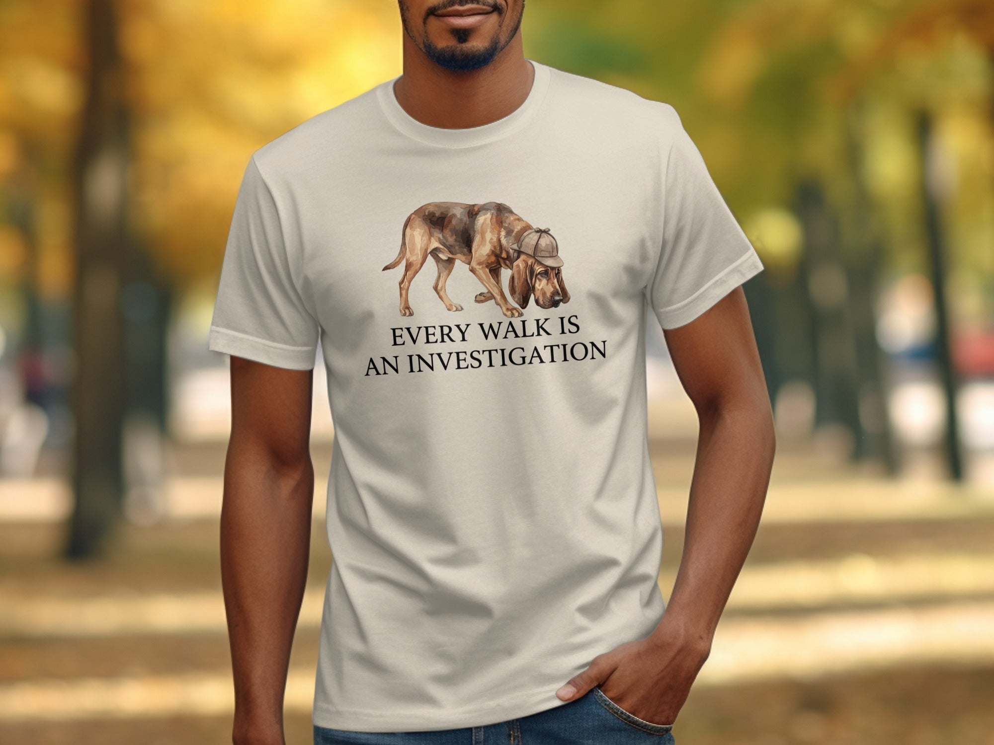 T-shirt with a dog in a hat and text "EVERY WALK IS AN INVESTIGATION".