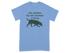 Light blue t-shirt with dog graphic and "Life update: My lab smelled a thing" text.