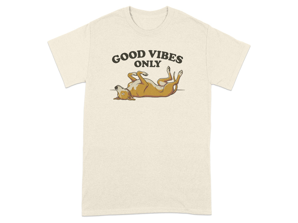Cream t-shirt with a dog lounging on its back and text "GOOD VIBES ONLY".