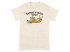 Cream t-shirt with a dog lounging on its back and text "GOOD VIBES ONLY".