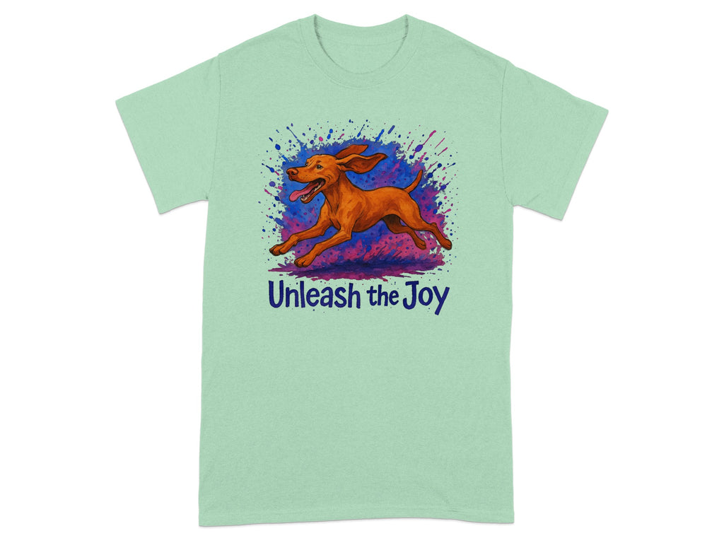 Mint green t-shirt with illustrated running dog and text "Unleash the Joy."