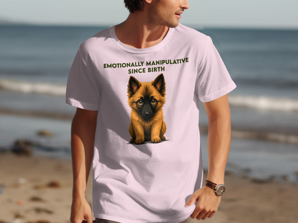 Pink t-shirt with a German Shepherd puppy and text "Emotionally Manipulative Since Birth".