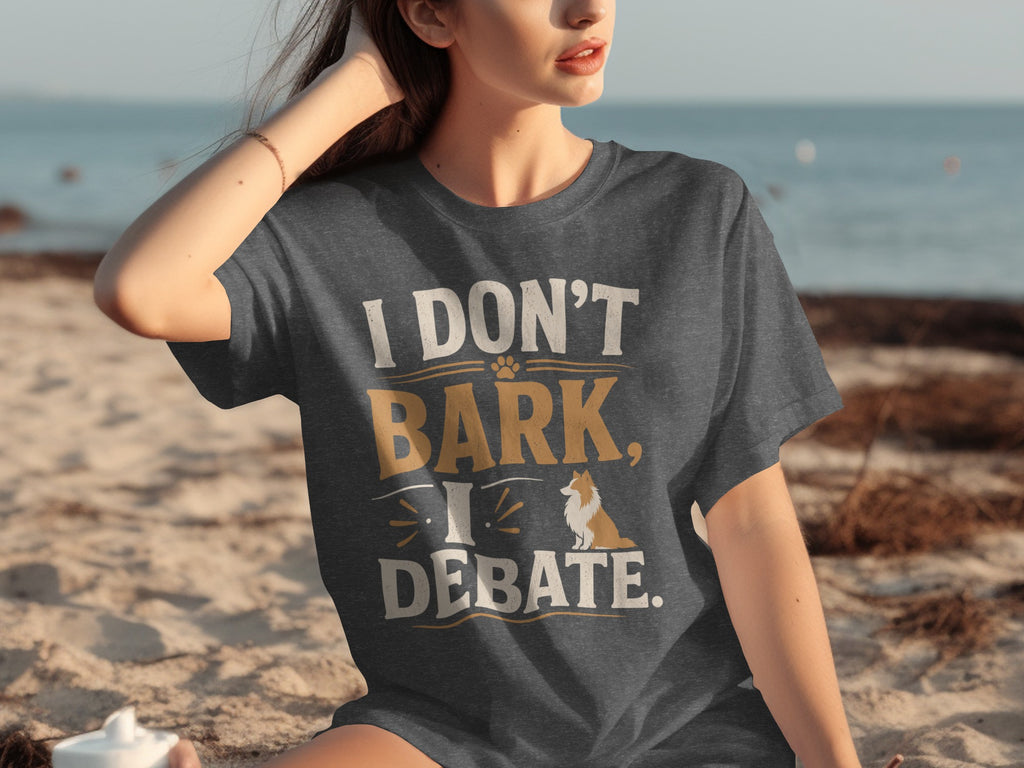 Dark gray t-shirt with white and gold text and a corgi graphic.