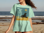 Light green t-shirt graphic with black lab, sun, and text "LAB DAYS ARE THE BEST DAYS".