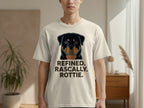 Cream t-shirt with a Rottweiler graphic and text "REFINED. RASCALLY. ROTTIE."
