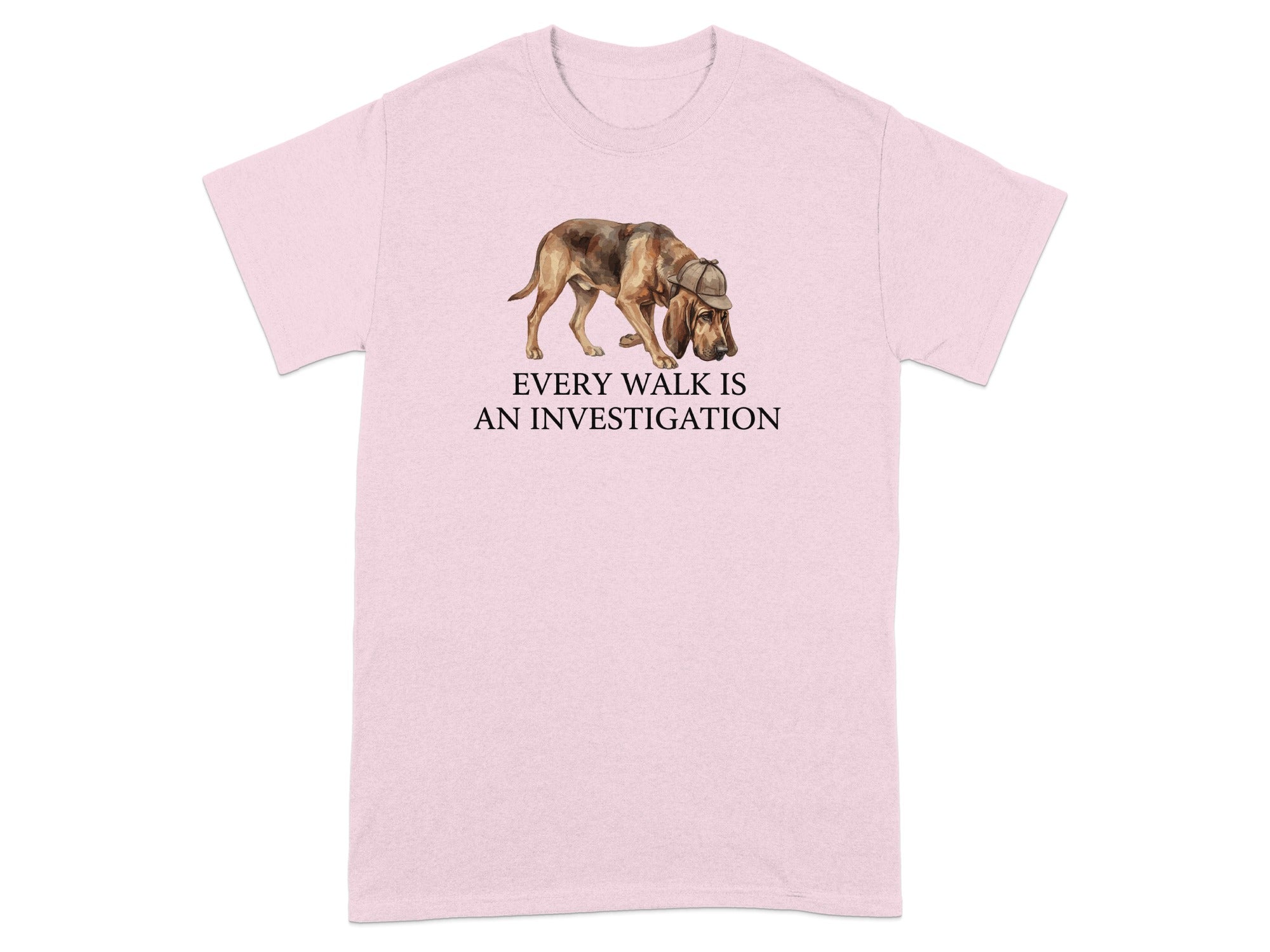Pink t-shirt with a bloodhound in a detective hat and text "EVERY WALK IS AN INVESTIGATION".