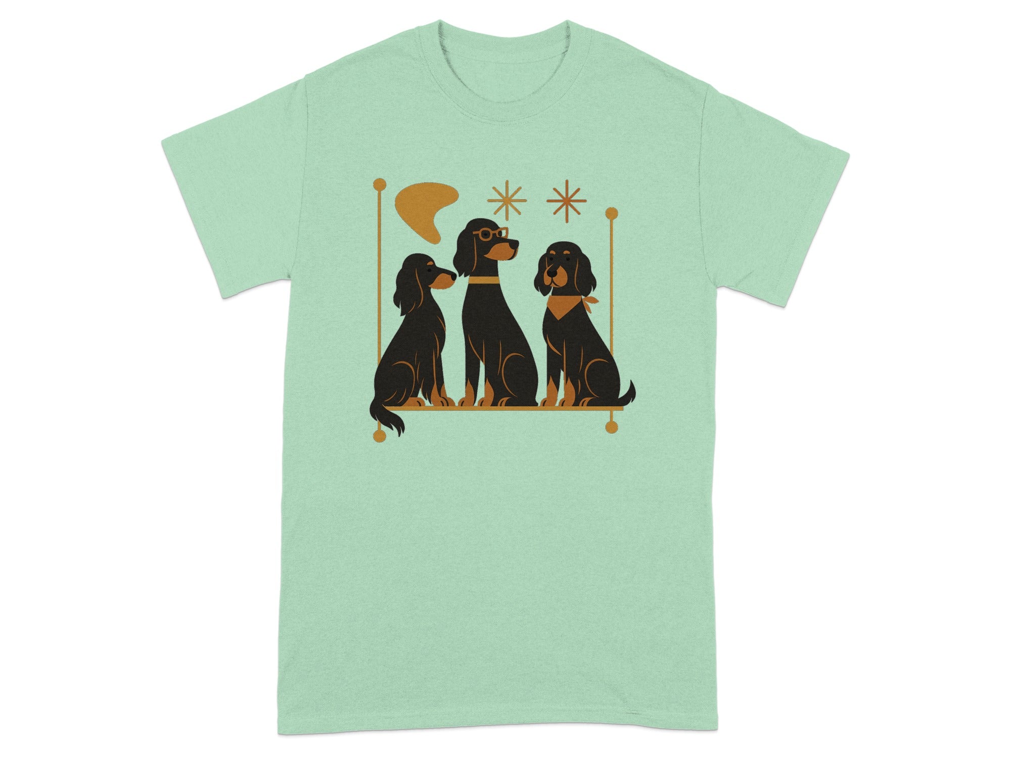 Three black dogs with exaggerated ears sit on a gold bench against a mint green t-shirt.