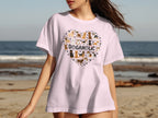 Pink t-shirt with a heart-shaped collage of various dog breeds and "DOGAHOLIC" text.