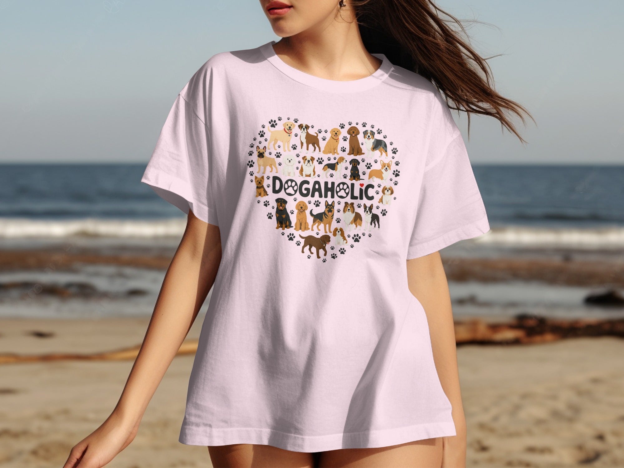 Pink t-shirt with a heart-shaped collage of various dog breeds and "DOGAHOLIC" text.