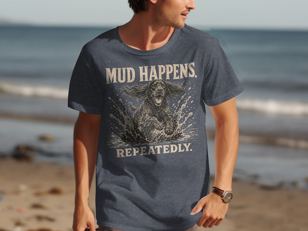 Dark t-shirt with "MUD HAPPENS REPEATEDLY" and a splashing dog graphic.