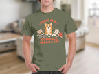 Green t-shirt with "Chaos in a Compact Package" and a corgi illustration.