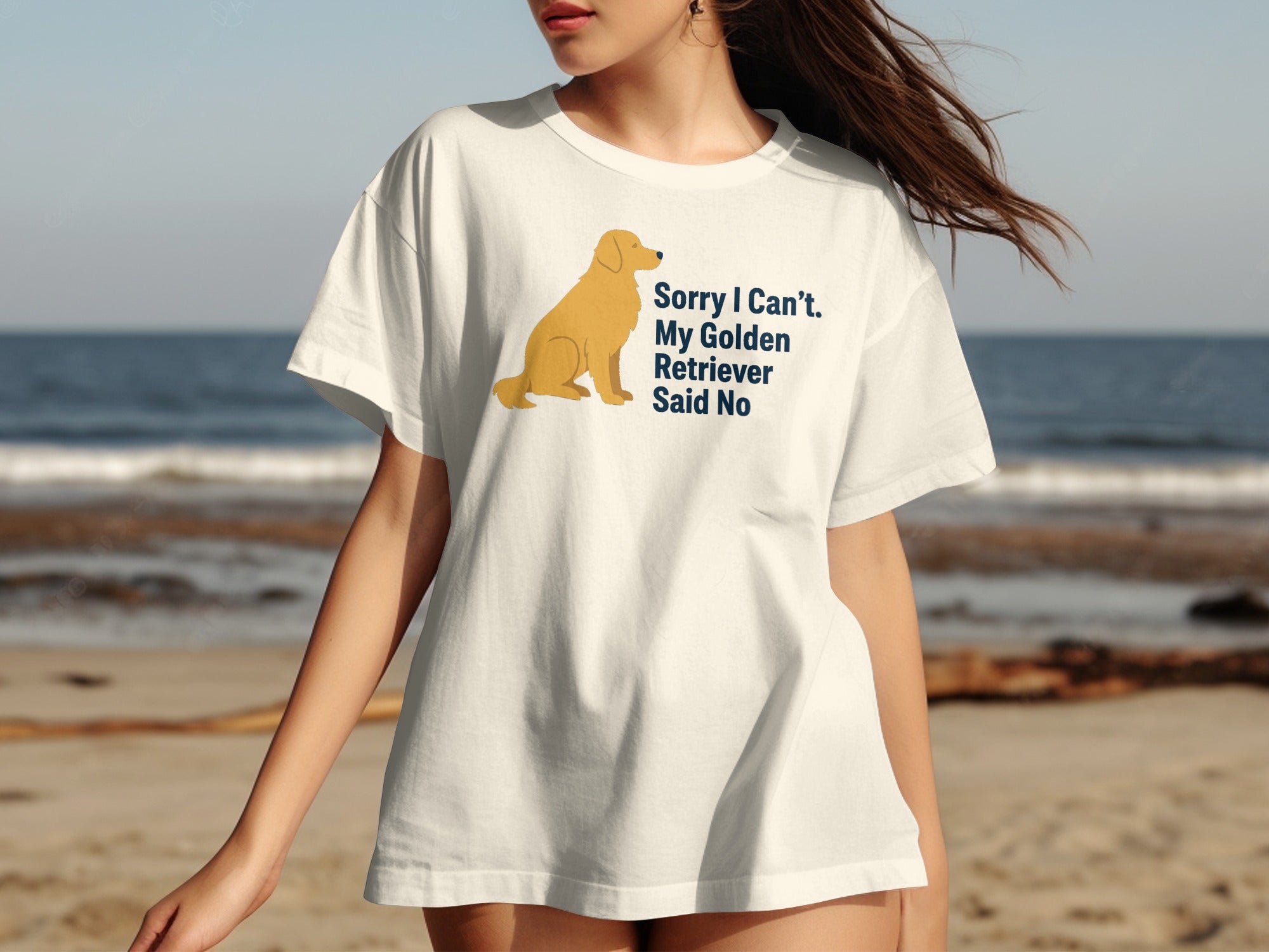 White t-shirt with graphic of a golden retriever and text "Sorry I Can't. My Golden Retriever Said No".