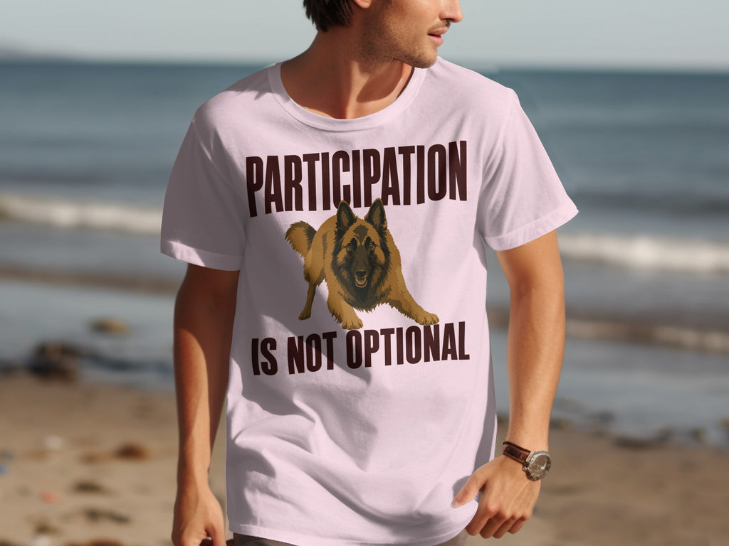 Light pink t-shirt with a German Shepherd and text "PARTICIPATION IS NOT OPTIONAL".