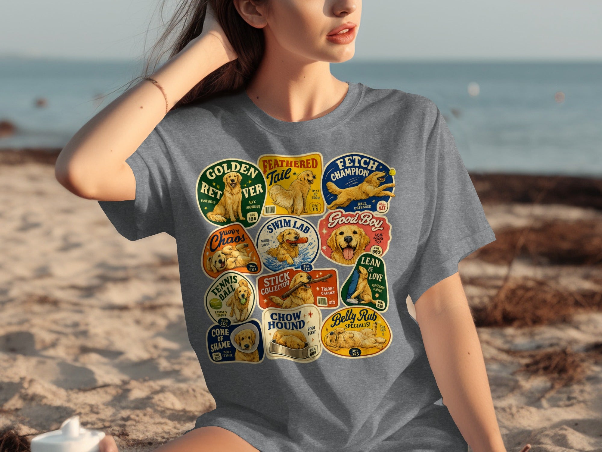 T-shirt featuring multiple dog breed illustrations with humorous slogans and labels.