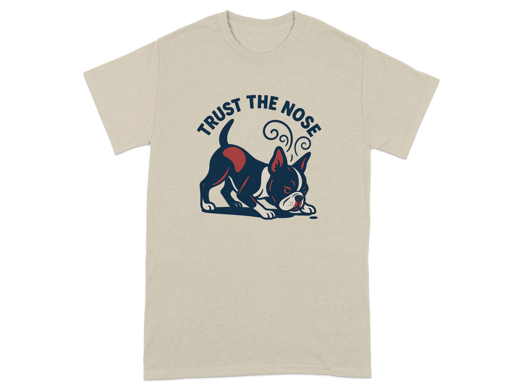 Tan t-shirt with a graphic of a Boston terrier dog and text that says "TRUST THE NOSE".