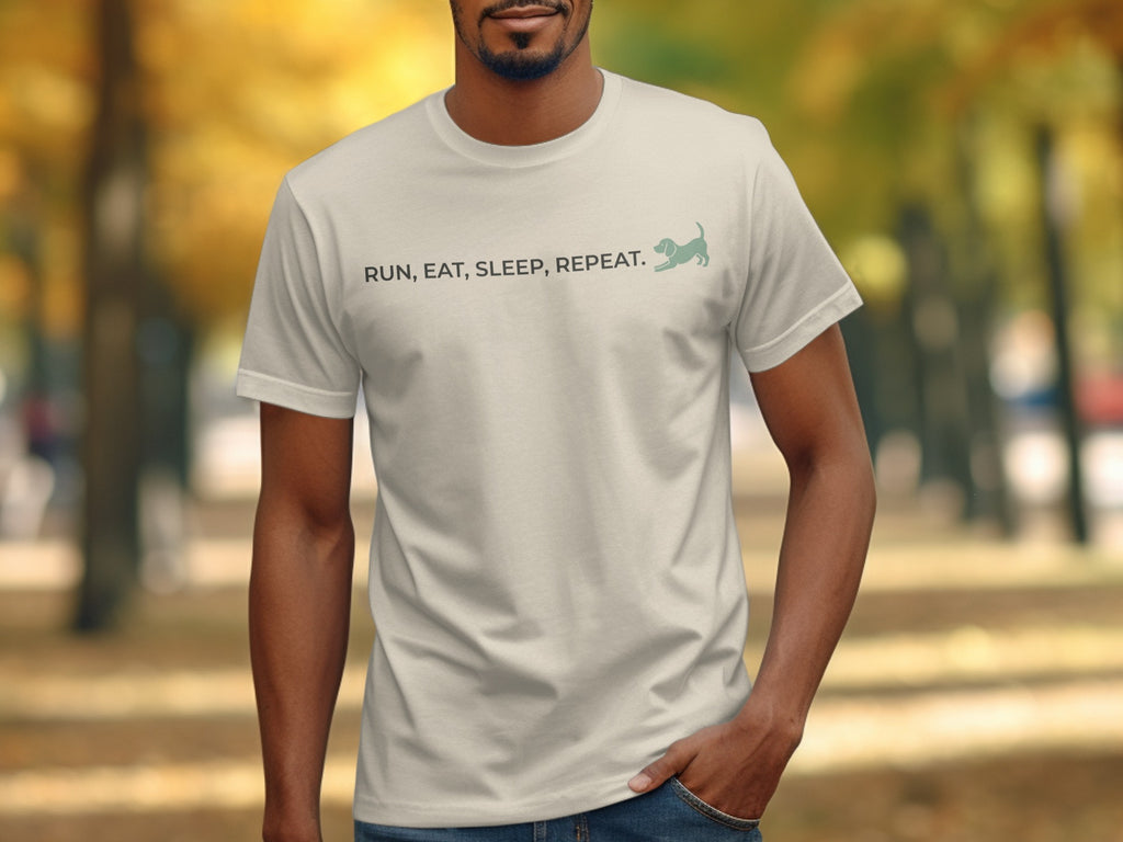 Man wearing a light t-shirt with "RUN, EAT, SLEEP, REPEAT." text and dog icon.