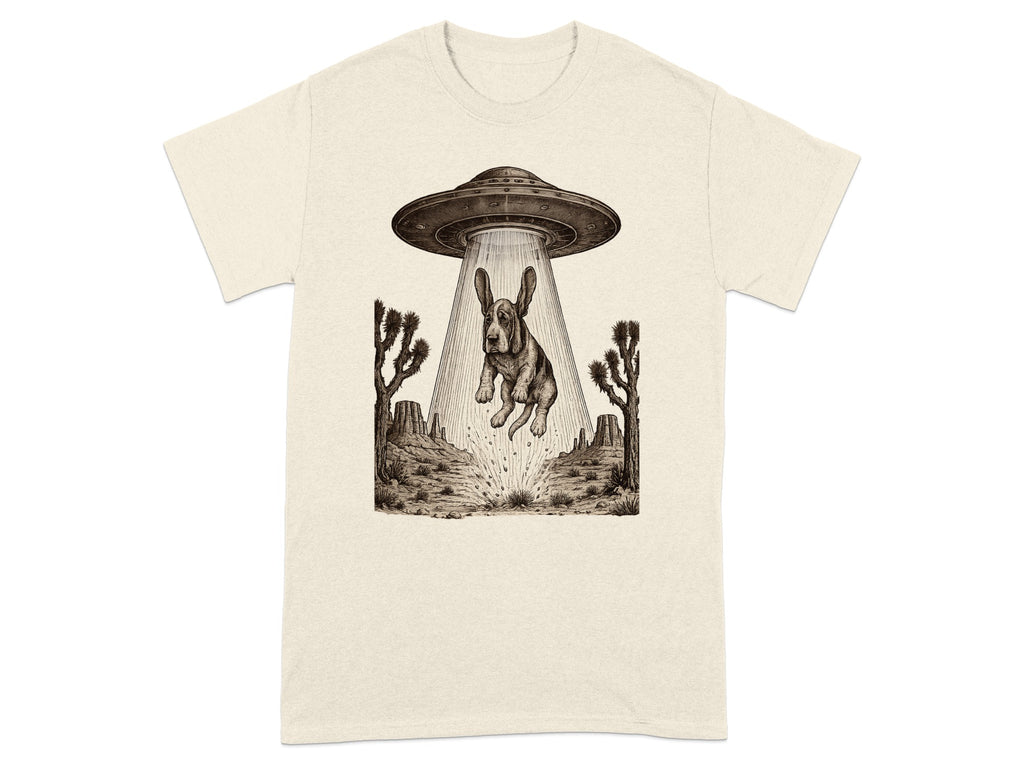 Brown and white drawing of a dog being abducted by a UFO in a desert landscape.