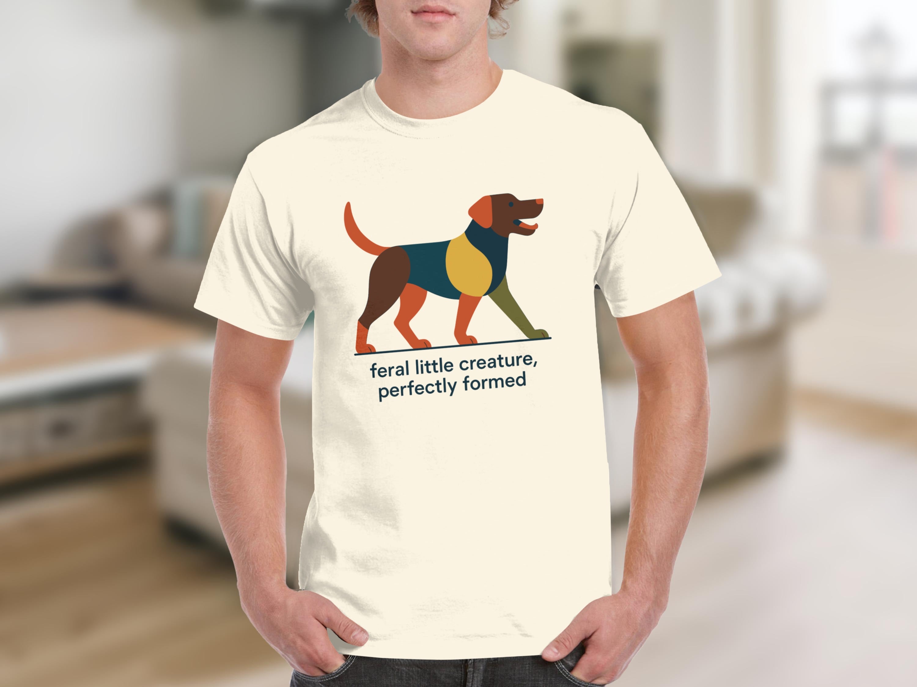 Cream t-shirt with colorful abstract dog graphic and text.