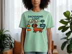 Light green t-shirt with "Dachshund Logic" flowchart and cartoon dachshund.