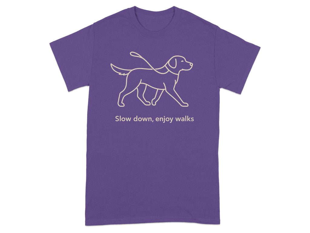 Purple t-shirt with a dog outline and the text "Slow down, enjoy walks."
