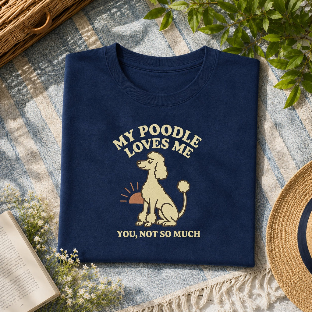 My Poodle loves me tee on a navy shirt, folded flat lay