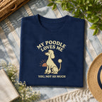 My Poodle loves me tee on a navy shirt, folded flat lay