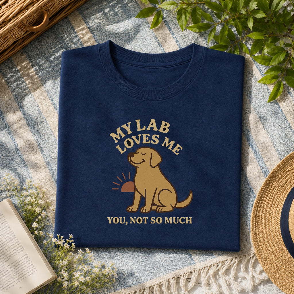 My yellow lab loves me tee on a navy shirt, folded flat lay
